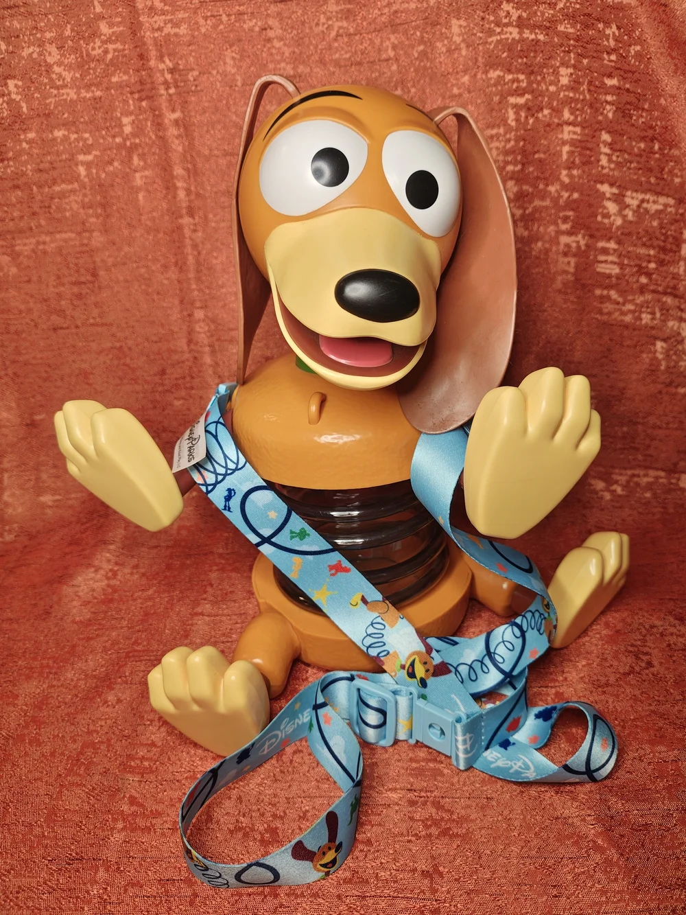 Disney Orange Slinky Dog Pop Corn Bucket, Sipper with Blue Character Lanyard